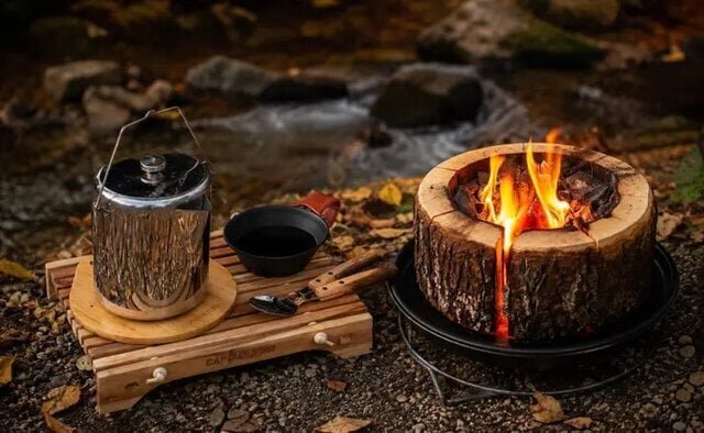 Feeling like a pro camper! The beautifully crafted "natural wood grill" ignites instantly with just a single match