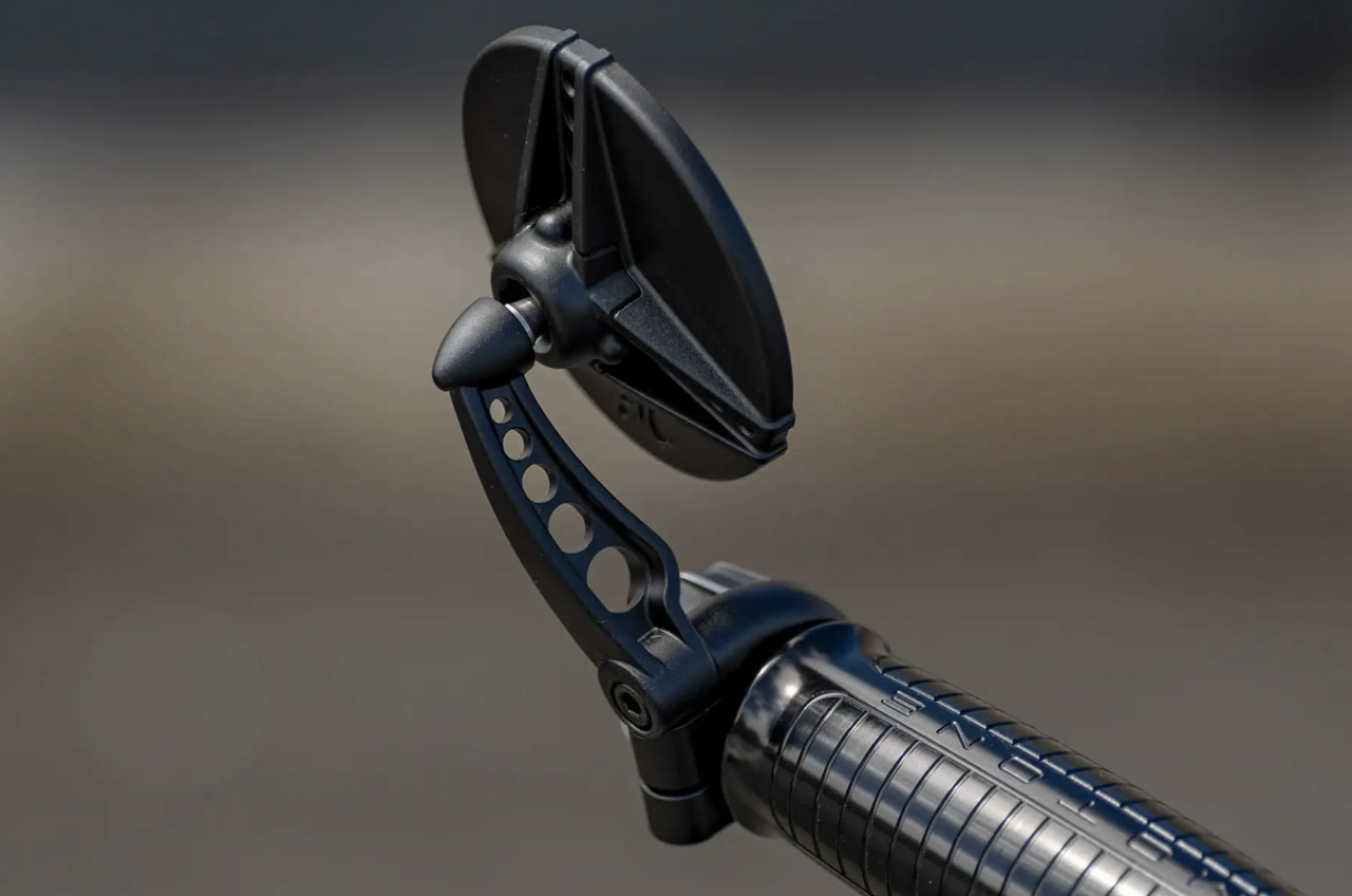 Bold "cut-outs" for strength and lightweight! A relaxed custom with aluminum billet bar end mirrors.