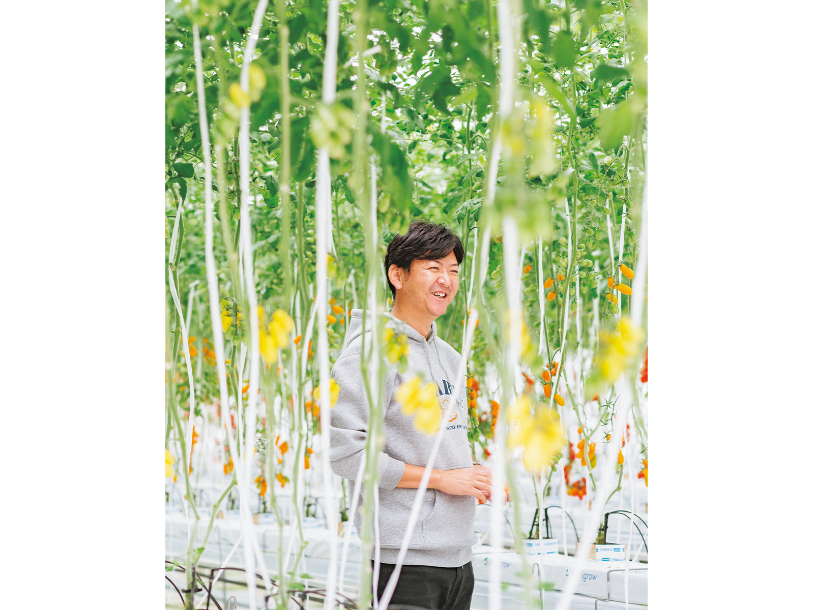 浅井さんが着用しているパーカは、少しでも農作物で応援ができたらと、今年からスポンサーになった三重の女子ラグビーチーム「PEARLS」のもの。