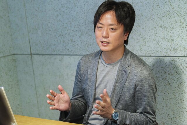 話をする澤田社長