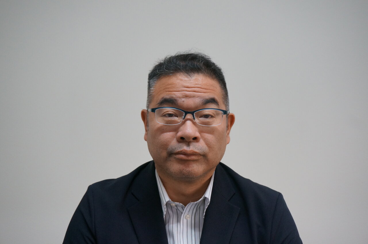 図2　村松大輔常務取締役
