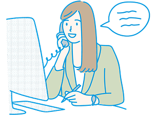 モニターを見ながら電話する女性