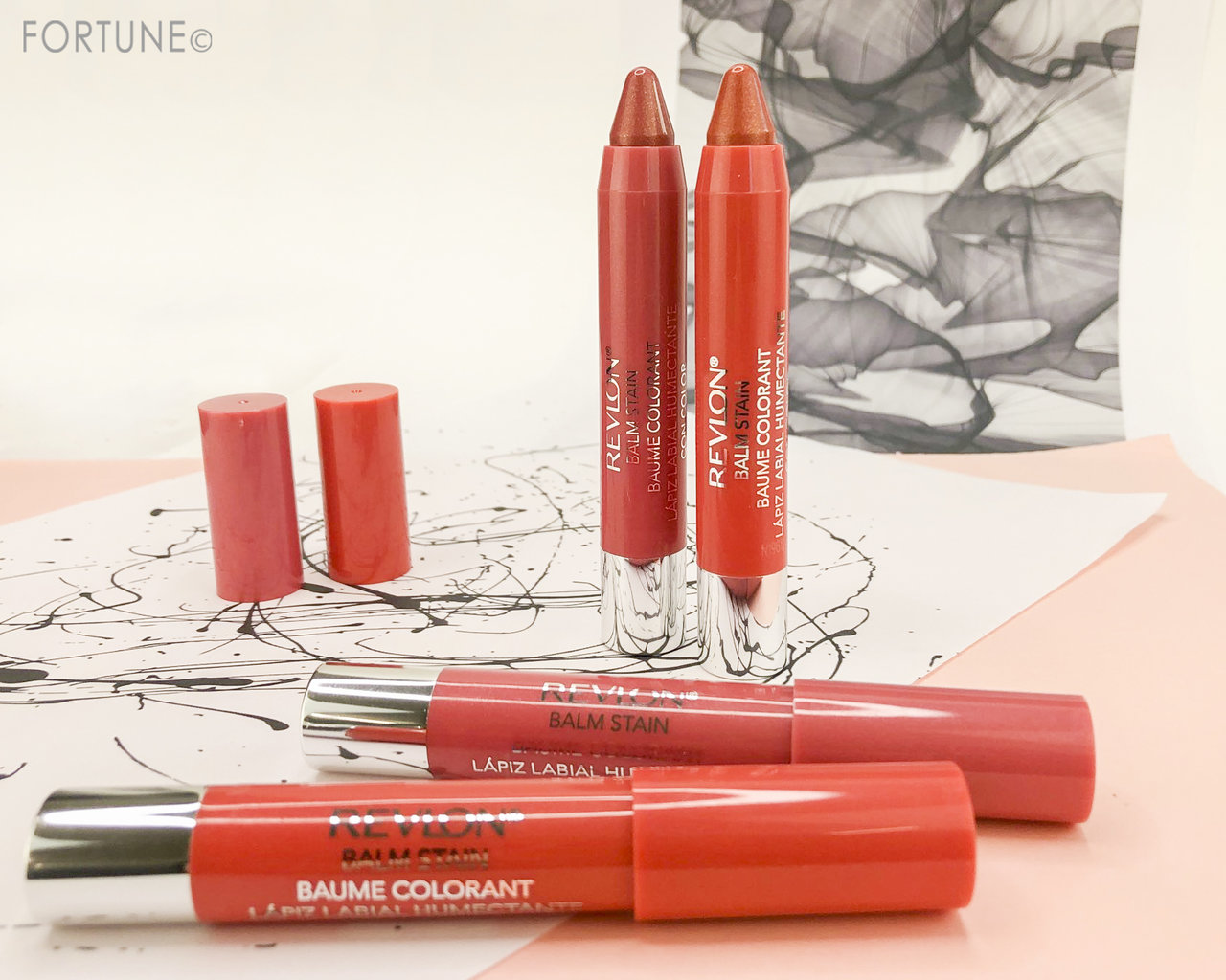 画像：レブロン「バーム ステイン」095 コーラル クリスタル／100 ルビー クオーツ