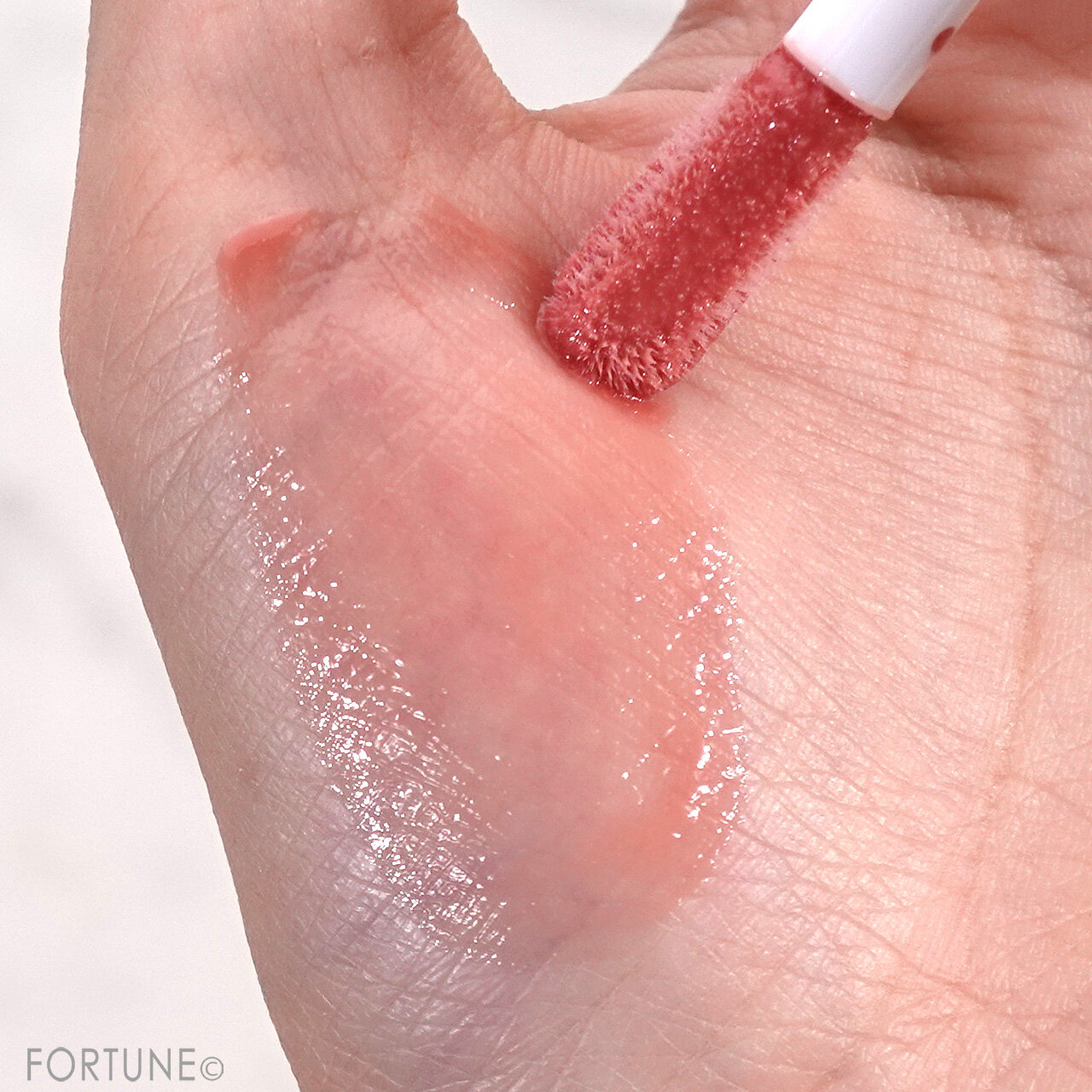 DECORTÉ（コスメデコルテ）　『コスメデコルテ プランピング リップセラム WHITE BLISS』　「05 winter bouquet」