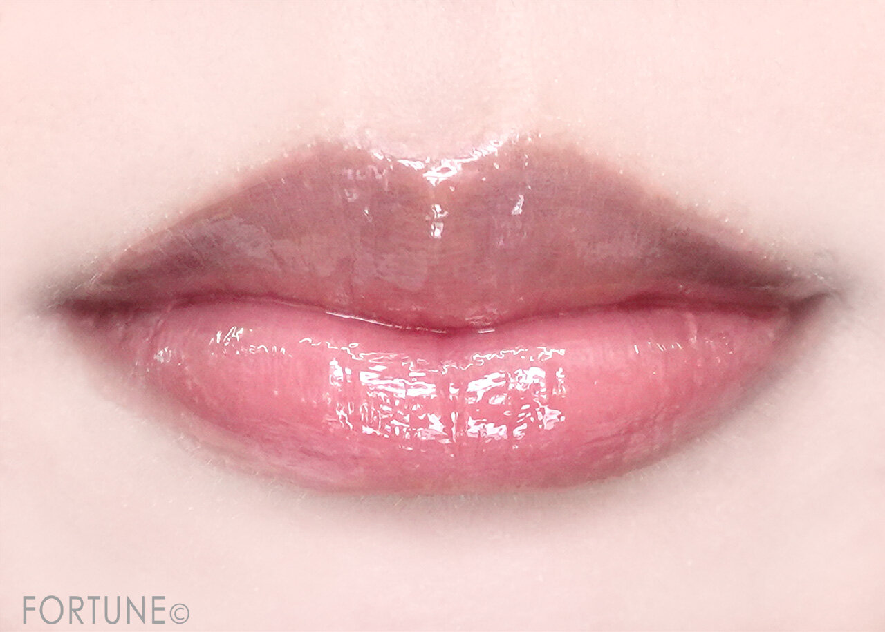 DECORTÉ（コスメデコルテ）　『コスメデコルテ プランピング リップセラム WHITE BLISS』　「05 winter bouquet」