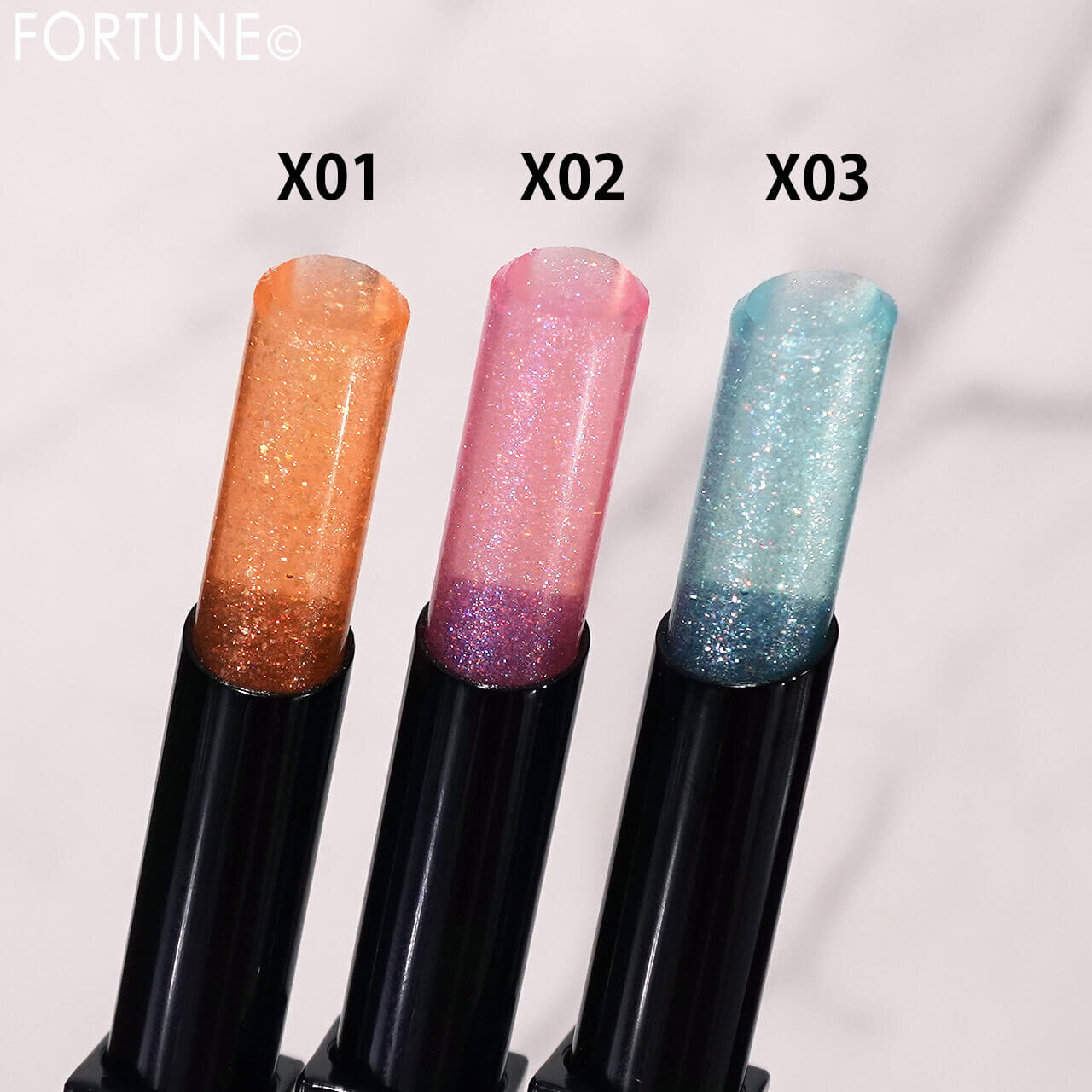   THREE（スリー）　　『THREE グリタリングジェリーリップ』　X01 X02 X03
