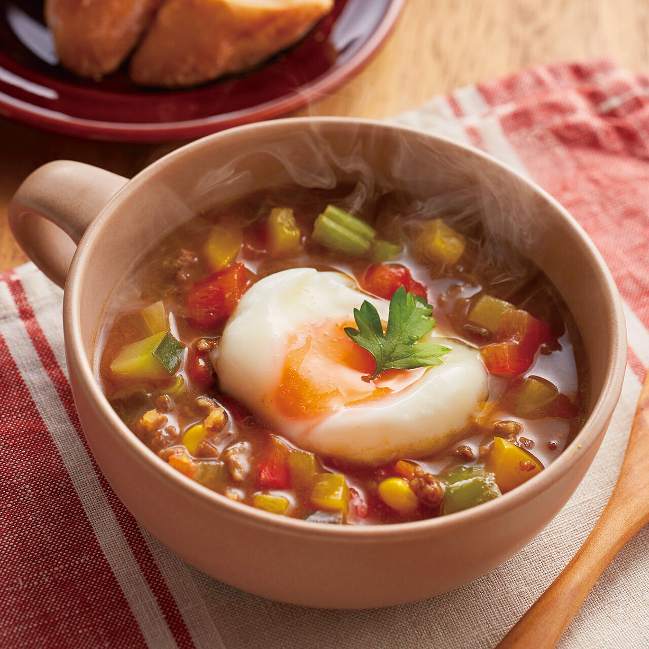 カレースープの半熟玉子のせ